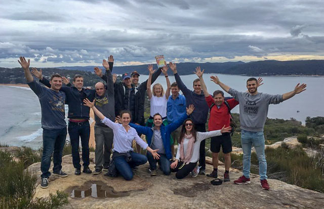 World Transformation Movement members at Palm Beach Group of World Transformation Movement members on cliff top with FREEDOM