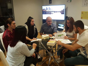 Melbourne WTM Centre group with six people around table studying FREEDOM